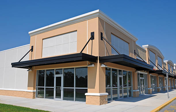 Beige building exterior with clean architectural finishes and durable exterior coatings by a painting company in Hillsborough County, FL.