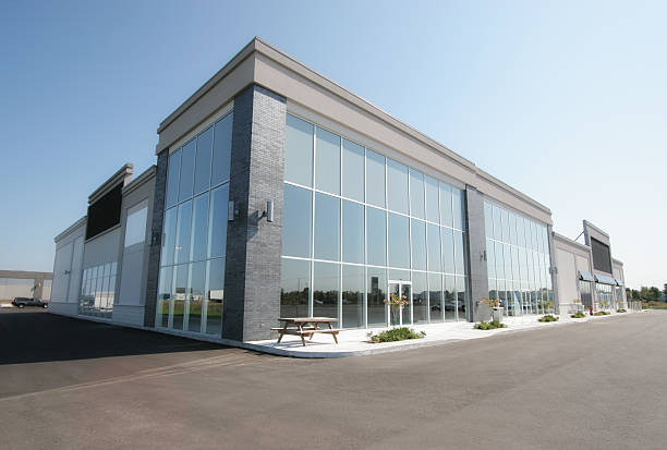 Grey building exterior with clean lines and professional exterior finishes by a painting company in Hillsborough County, FL.