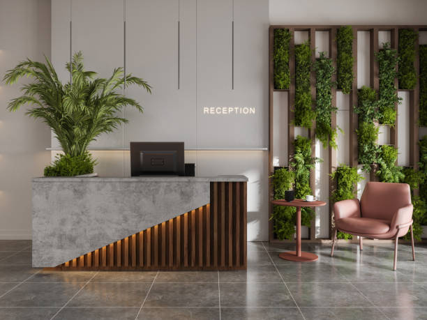 Modern commercial reception with warm white painted walls with wood slat accents by an interior painter in Polk County, FL.