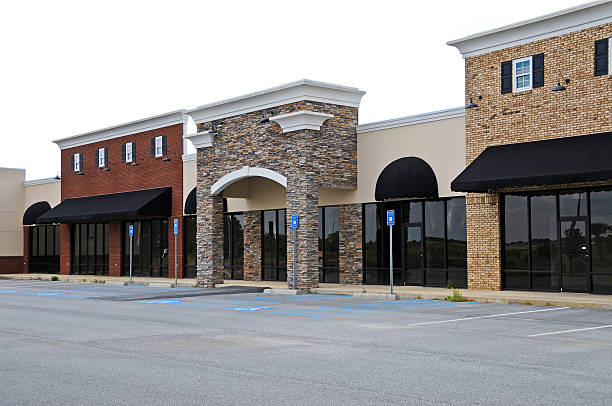 Retail building exterior with updated storefronts and modern finishes by a painting company in Polk County, FL