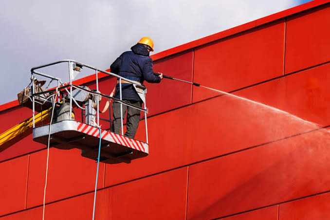 Commercial exterior pressure washing by a painting company in Hillsborough County, FL.